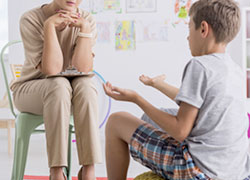 Psychologist listening to a Kid