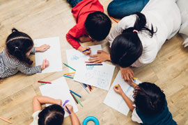 Group of children in writing activities